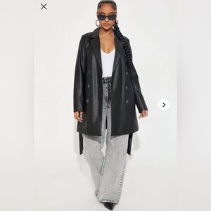 Chic black double breasted vegan leather coat.